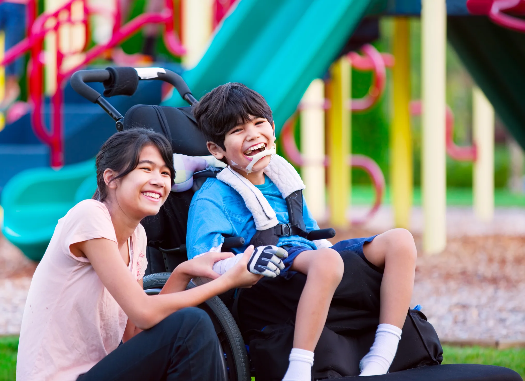 Boy in wheelchair at playground
